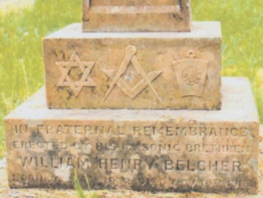 Masonic symbols on the base of the grave marker for William Henry Belcher.